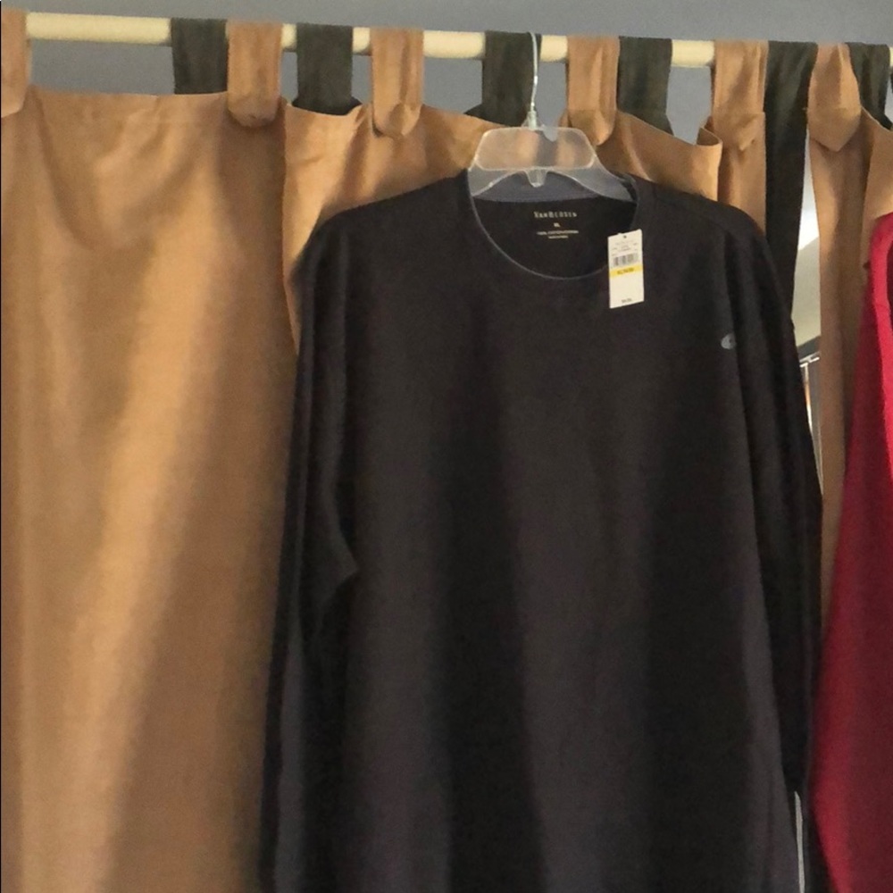 Brand new Van Heusen black long sleeved shirt